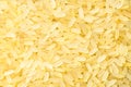 Background - raw parboiled long-grain rice Royalty Free Stock Photo