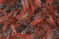 Background of red and brown thread