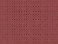 Background of red peg board with holes Royalty Free Stock Photo