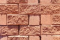 Background of red spliter brick block with torn edge Royalty Free Stock Photo