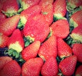Background of red strawberries for sale with old effect