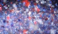 Red, white, and blue sparkling glitter scattered with shiny stars confetti. 4th of July celebration background Royalty Free Stock Photo
