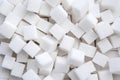 Background of refined sugar. Close-up of white sugar cubes. Royalty Free Stock Photo