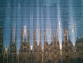 Background reflection of Romanesque, Gothic architecture in modern glass facade, avant-garde architecture in modern times