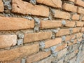 a background with a repeating pattern of a brick wall surface