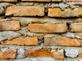 a background with a repeating pattern of a brick wall surface