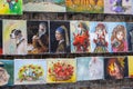 Background with reproductions of paintings hanging on a barbican in Krakow, Poland