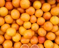 background of ripe orange oranges for sale at supermarket Royalty Free Stock Photo