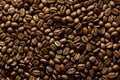 Background of roasted coffee beans. Top down view of full bean coffee