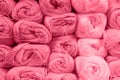 background of rows skeins of fluffy wool yarn for knitting soft red pink purple hue colors. toned in viva magenta Royalty Free Stock Photo