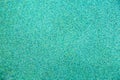 Background of rubberized coating used on children`s and sports grounds turquoise. Backgrounds texture Royalty Free Stock Photo