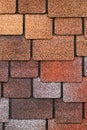 Background, samples, multi-colored flexible, soft tiles to cover the roof of the house.