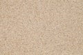 Background, sand, sandy surface uniform texture pattern, grains of sand close-up Royalty Free Stock Photo