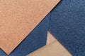 The background of the sandpaper surface, where the grains of sand on the sandpaper can be seen, and the difference in colors on