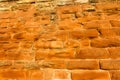 Background, sandstone brick wall lit by setting sun Royalty Free Stock Photo