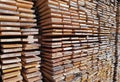 Background of sawn boards in a stack. lumber at a sawmill Royalty Free Stock Photo