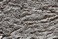 Background of scattered dirt, dust, stones and pieces of gray