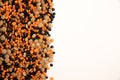 Background from scattered lentils of different varieties, black, brown and orange. Legumes. Copy space Royalty Free Stock Photo