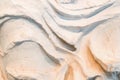 Background - sculpted folds in grecian robe from ancient marble statue