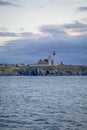 Background with sea and lighthouse on the coast of Brittany, Finistere, France