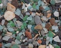 Background from sea pebbles with color of multi-colored glass Royalty Free Stock Photo