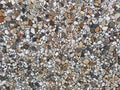 Background of sea stones of different shapes and tones. Small Naturally Polished Rocks, Pebbles background and pattern Royalty Free Stock Photo