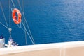 Background for a sea voyage on a yacht. Red lifebuoy, parapet boats Royalty Free Stock Photo