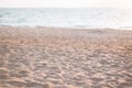Background of a secluded sandy beach in pastel shades.