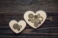 Background with shape of hearts, the gear mechanism and a key on Royalty Free Stock Photo