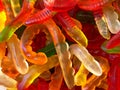 Background of shiny gummy worm candy