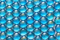 Background of shiny turquoise glass stones