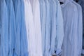 Background of shirts blue and white hanging on a hanger Royalty Free Stock Photo