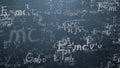 Background shot of blackboard with scientific and algebraic formulas and graphs written on it in graphics. Business Royalty Free Stock Photo