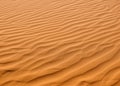 Background shot of a desert with wind blown sand pattern. Royalty Free Stock Photo