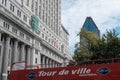 Empty, open top- tour bus seen in a major Canadian city during late summer. Royalty Free Stock Photo