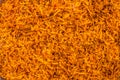 Background of shredded or grated turmeric roots into fine pieces for medicinal and food purpose