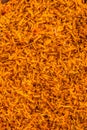 Background of shredded or grated turmeric roots into fine pieces for medicinal and food purpose