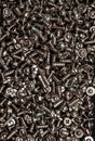 A background of silver screws and bolts. Various screws. Hardware Royalty Free Stock Photo