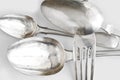 Background with silver spoons and dinner fork Royalty Free Stock Photo