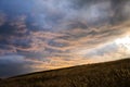 Background of the sky with clouds at sunset with ground