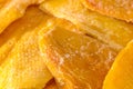 background of sliced ??appetizing dried mango on a white background, studio shot