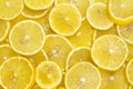 Background of sliced ripe lemons