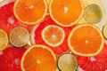 Background of slices of citrus fruits close up