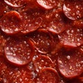 Background of slices of salami with sesame seeds. Close-up