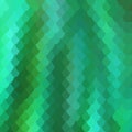 Background of small colorful green fish scales forming a background of reptile and snake skin.. Royalty Free Stock Photo