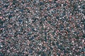 Background with small multicolored pebbles road texture