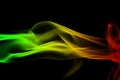 background smoke curves and wave reggae colors green, yellow, red colored in flag of reggae music Royalty Free Stock Photo