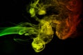 Background smoke curves and wave reggae colors green, yellow, red colored in flag of reggae music Royalty Free Stock Photo