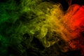 Background smoke curves and wave reggae colors green, yellow, red colored in flag of reggae music Royalty Free Stock Photo