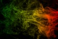 Background smoke curves and wave reggae colors green, yellow, red colored in flag of reggae music